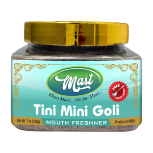 A close-up image of Tini Mini Goli Mouth Freshener - 180gm bottle with refreshing mint leaves and spices.